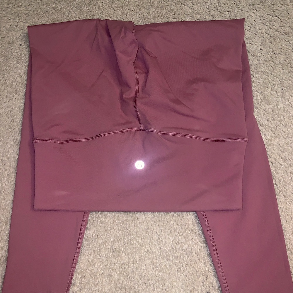 Lululemon leggings size 8, pinkish nude color, worn a few times, great quality!